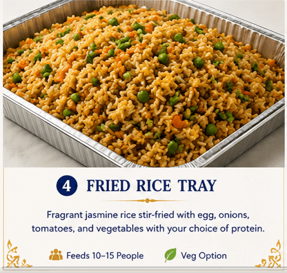 Large aluminum tray of jasmine fried rice with green peas, egg, and diced orange vegetables.